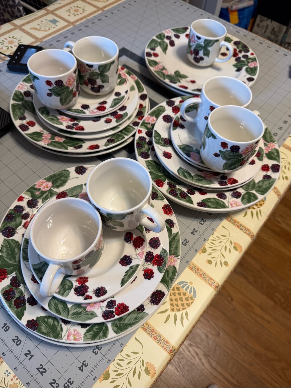 stoneware dinnerware set is in the Tienshan pattern named Raspberry Social.